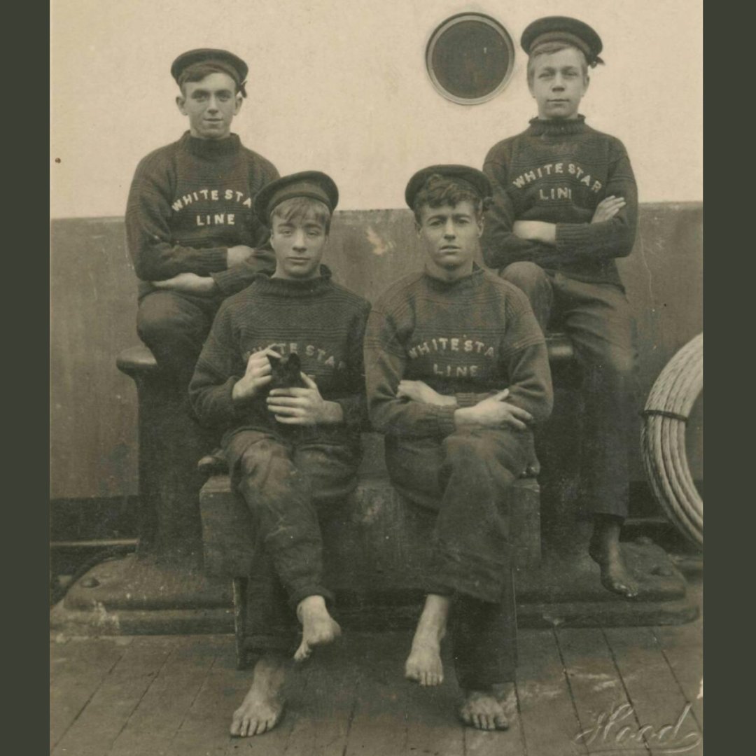 seamuseum_'s tweet photo. Australian swimming champion Beatrice Kerr received a postcard with a black and white photograph of four young sailors wearing White Star Line jumpers. The image shows them posing on deck with a cat.
#TuesdayTails #shipcat https://t.co/MUtsx3nlYh