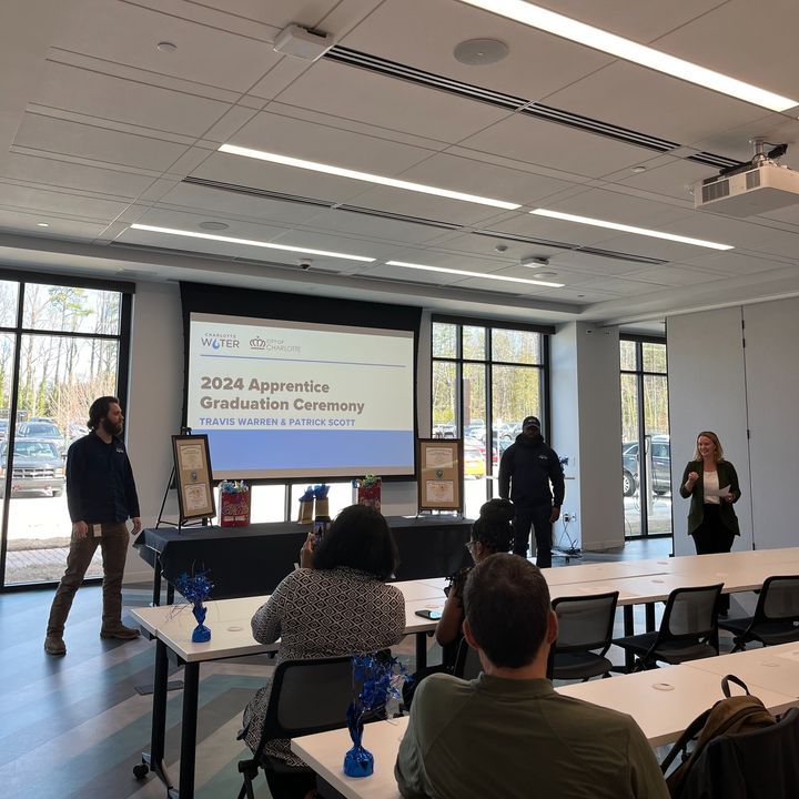CLTWater's tweet photo. Congratulations to Travis Warren and Patrick Scott for graduating from the Charlotte Water Apprenticeship program today! We're so grateful to have them on #TeamWater! #OneWaterStrong https://t.co/VIIUIa9aZ5