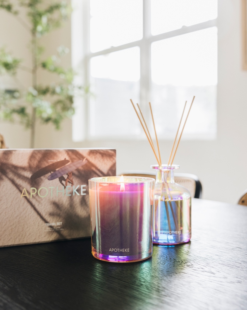 Experience the lively aroma of Bergamot Tangerine and let it inspire your imagination as you indulge in a candle, reed diffuser or travel set featuring signature APOTHEKE scents waiting to be discovered.⁠