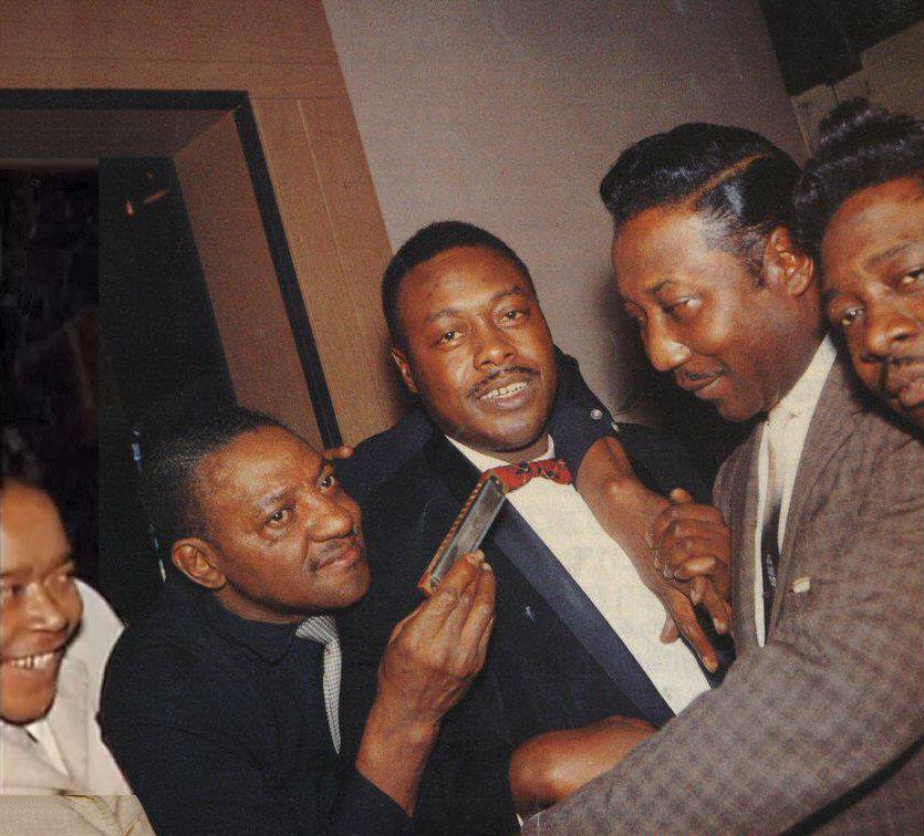 James Cotton, Sonny Boy Williamson II, Jimmy Rogers, Muddy Waters and Otis Spann in Muddy’s basemen in Chicago in 1959.
Photo by © Georges Adins