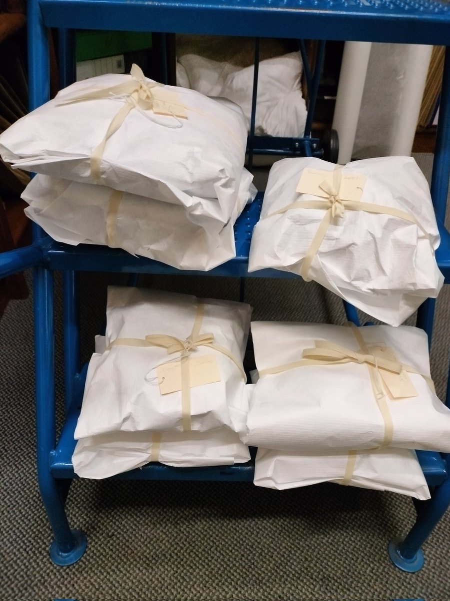 7 school caps sorted with acid free tissue paper and Tyvek and labels this afternoon.... Only 35+ to go 🙃