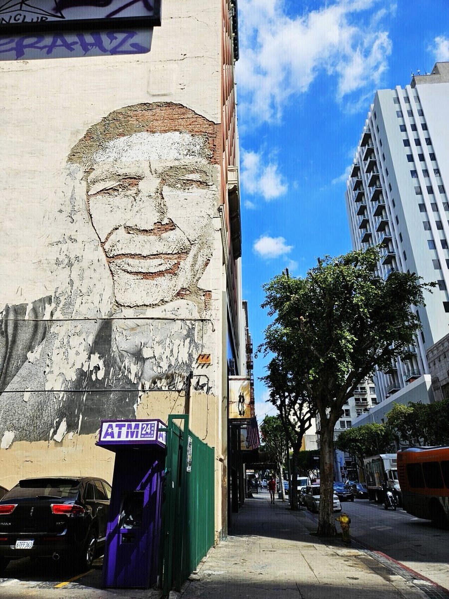 A carved bas-relief mural by Portuguese muralist Vhils on Spring Street in downtown Los Angeles. Photo taken on March 5, 2024.