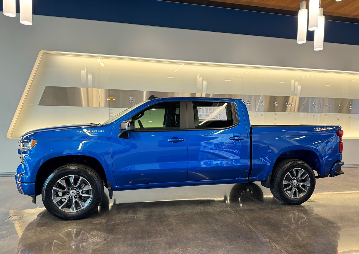 Lookin' sharp at our Training Facility at @HendrickCars! These beauties can be yours! Give our Internet Department a call and tell them you want the Pre-Owned White Z06 (stock # P19227) or the New Glacier Blue Metallic Silverado (stock # R29561) 980-242-5624.