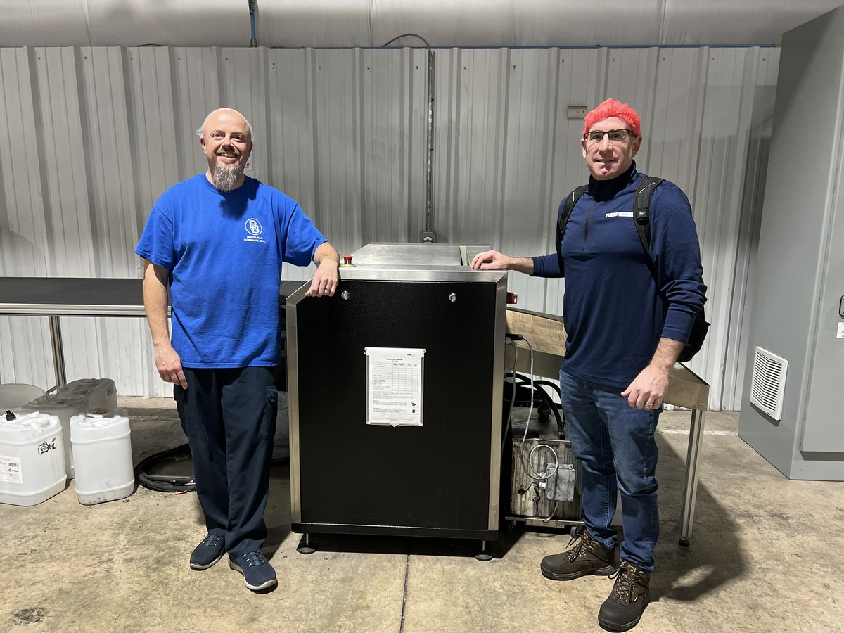 Joe Almeida visited with our friend and customer Steve Mead from Bison Bag Co Inc today. They are pictured with one of Bison Bag's TWO Flexo Wash Plate Washers. The first Plate Washer improved their operation so much they purchased a second!