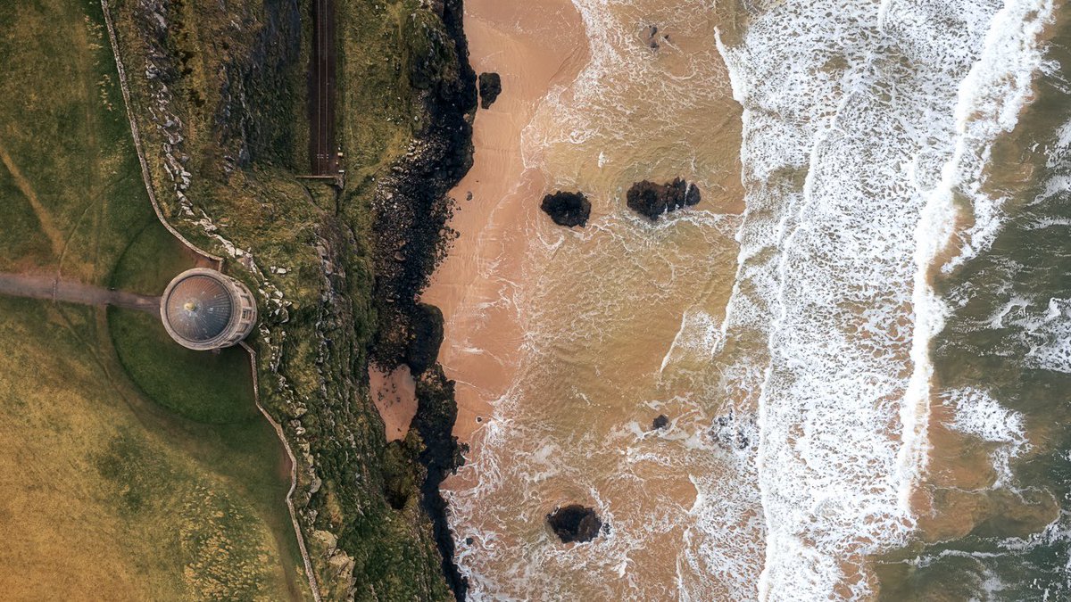 The Mussenden Temple balancing on the edge of a sheer 120ft drop into the wild Atlantic below. It wasn’t always this close. 200 years ago you could drive a horse and cart around it. 50 years ago you could have a picnic on the seaward side. Time has eroded 3 metres of cliff.