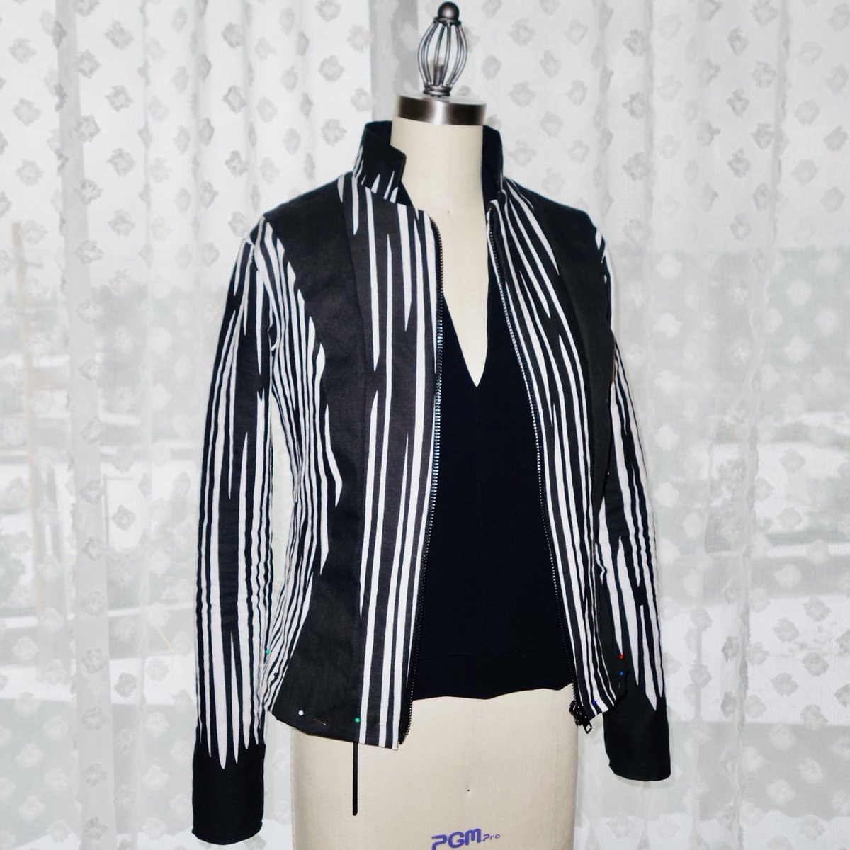 A Burtonesque jacket and crepe V-neck top almost finished.

#sewing #designs #fabric