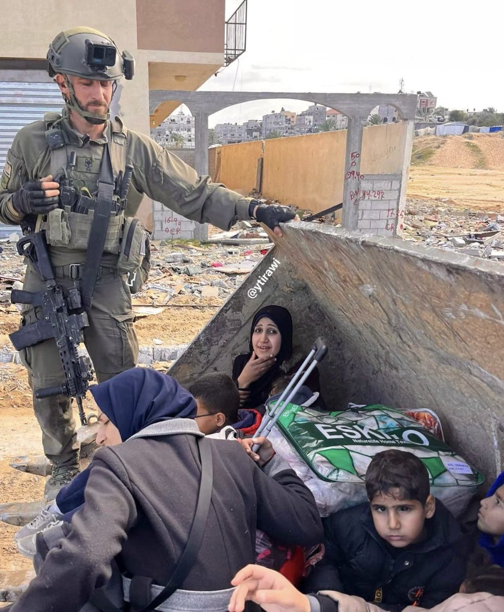 Khan Younis | Israeli soldier detaining women and children and putting them on a D9 bulldozer, photo was taken 12 Feb.

#Gaza