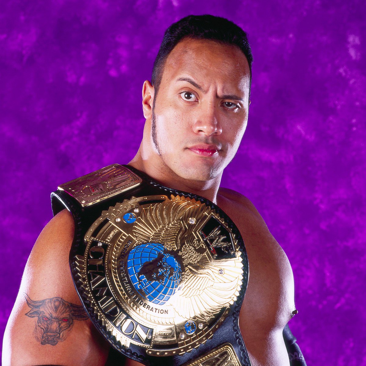 World Champion of the day: The Rock - Began his first run as WWF
