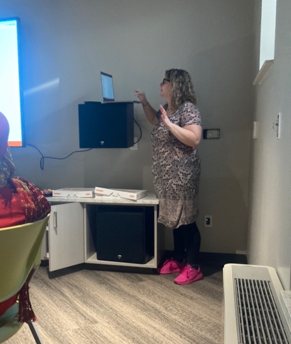 Digital Services All Star Maggie discussing her dashboard project.
