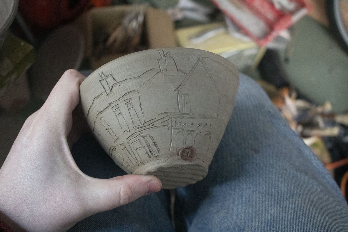 Yesterday, I spent some time decorating bowls in my studio, using slips and a random metal tool to scribe some drawings on a few of the bowls. I even went out onto the street and sketched some of the buildings I could see, other things were from my sketchbook.