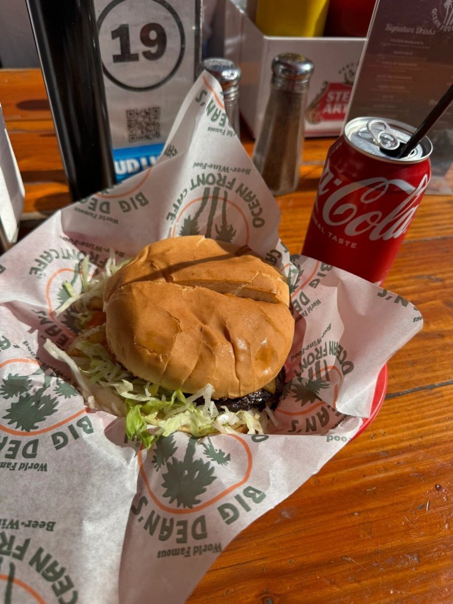 Enjoying a classic hamburger and soda combo 🍔🥤 #burgerlove #foodieadventures