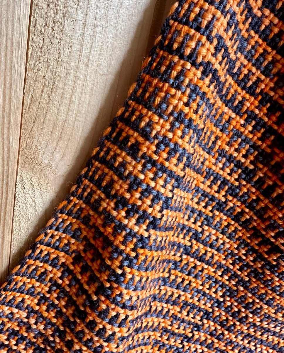 Taking hand-dyed shades of orange & black, handwoven in a striking pattern.

In neckwarmer or scarf, pure, genuinely soft merino or alpaca will give breathable comfort.

#naturalfibres #madetolast #MHHSBD #giftideas #neckwarmer #scarf #artisancraft #noplastic #slowfashion