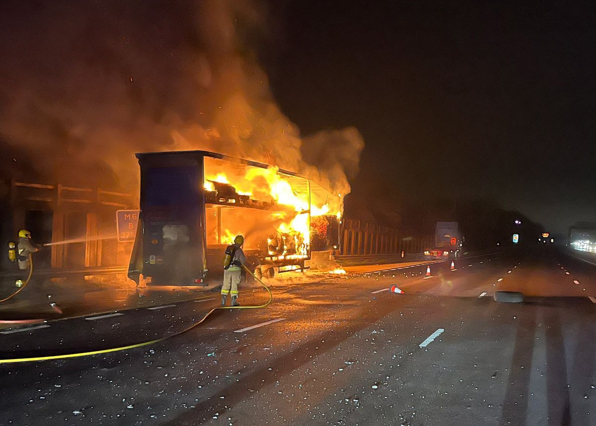 CheshireFire's tweet image. Firefighters extinguished a fire involving a heavy goods vehicle trailer on M6 Southbound between Junctions 18 to 17. 

The photo shows @MiddlewichFS, who were first on the scene, tackling the blaze.

For full details 👉 orlo.uk/3THJ0