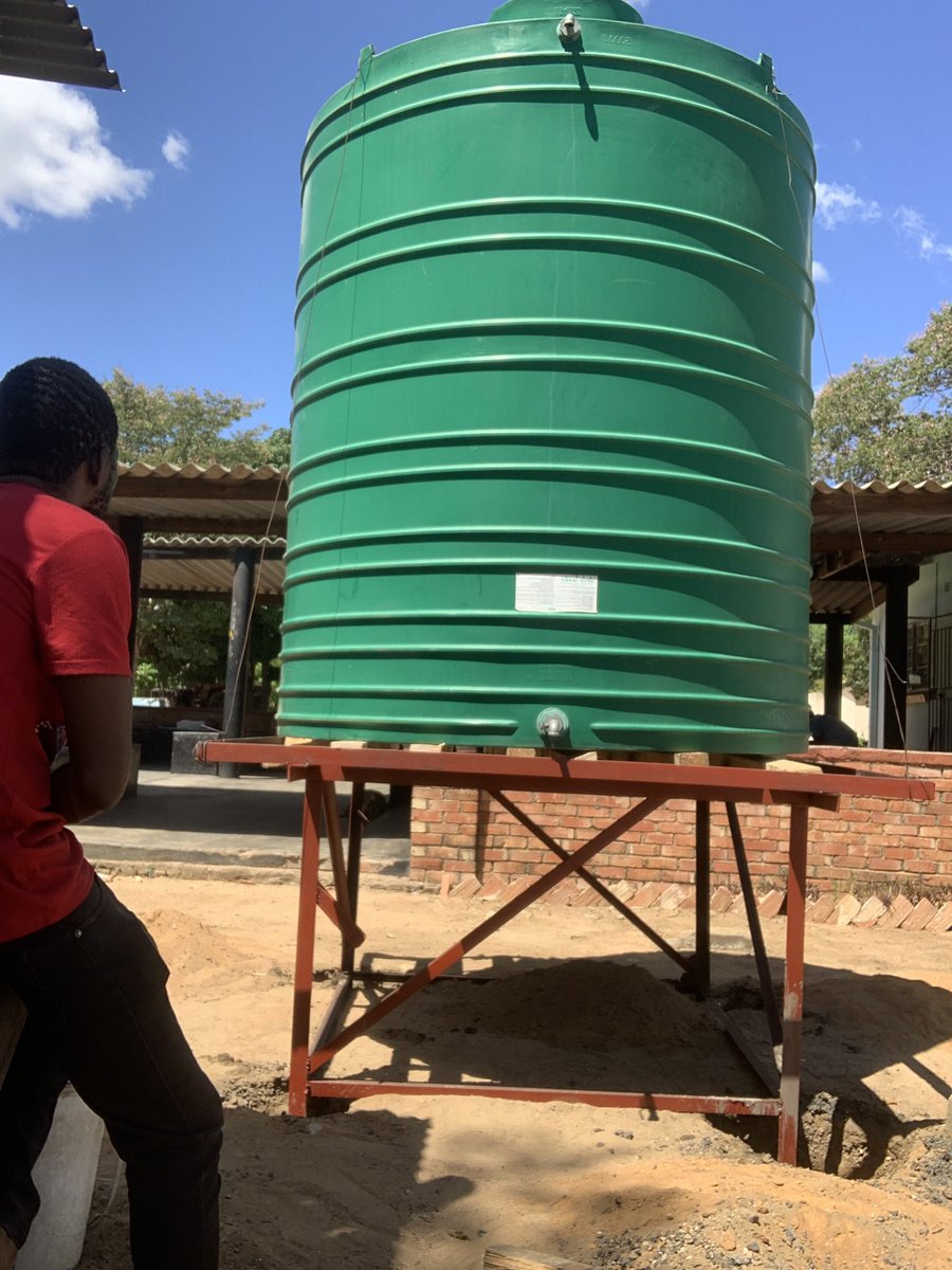 tikobane's tweet photo. Clinic water storage tank now up and ready to fill up . The clinic has gone for a week without water because of the faulty tanks . Community solutions from local people. #togatherwewin https://t.co/SHuXgiDqQc