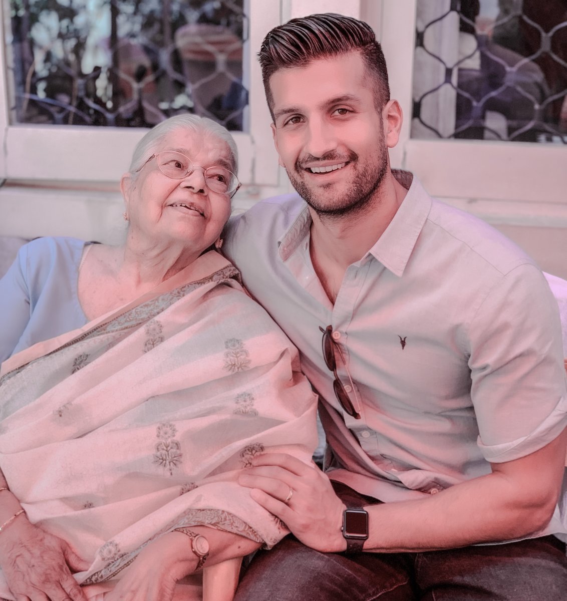 SahilBloom's tweet photo. My grandmother would have been 95 years old today.

A few years ago, my mom hired a writer to sit down with her and document stories from her life.

I think everyone should do this:

The process brought my grandmother immense joy—and the result will bring my family joy for years to come.

We had planned to give her the book on her 95th birthday—sadly, life had other plans.

My mom found the writer through an elderly care service in India.

Her request was for someone who would record and transcribe stories from my grandmother.

The writer was a recent university graduate named Raika Sengupta.

The process began shortly after the pandemic lockdowns ended in India.

Raika would visit with my grandmother every week.

Depending on my grandmother’s energy, they would meet for an hour or less.

Each time, they would pick up where they left off on her life journey.

Raika would record the conversation and then transcribe the recordings—mostly in my grandmother’s own words, with some stylistic improvements where necessary.

My grandmother was an AMAZING storyteller, so the writing naturally flowed.

The weekly meeting became a beautiful ritual.

During a time when there wasn’t much to look forward to because of COVID lockdowns and a diminished social life, my grandmother looked forward to these sessions.

They made her feel important again—such a powerful thing at her age.

Once the writing was complete, my mother—a beautiful writer herself—took the pen on editing and converting the stories into a book.

She worked with my grandmother on the flow and filling in the gaps.

They added chapters on special people in her life—siblings, friends, etc.

We wanted to add photos to the book, so the whole family got involved.

When I was in India last January, I got to sit with my mom, dad, and grandmother and go through old photos to include.

We uncovered some real gems. It was beautiful.

I didn't know it would be the last time I would see her in this world...

The book is almost complete. We will have enough copies made so that all of her family can have a copy to remember her by.

Her memory will be a blessing.

I really believe everyone should do this.

One of the saddest things is seeing our grandparents feel they are no longer “important” to anyone.

The process reminded my grandmother how much she is loved and how much she still has to offer the world.

Tonight, I'll be on stage in India in front of 1,000 people, with my parents in attendance. I know my grandmother will be sitting in the front row smiling at me.

Hug your loved ones close. Time is precious.

I love you and miss you, Avva.

♥️