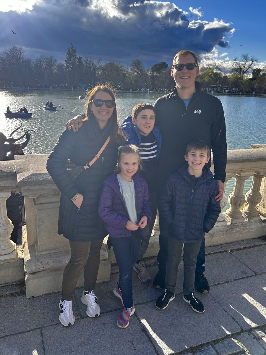 My wife and I standing with our 3 kids on the exact spot where we met 19 years ago. Retiro park, Madrid.