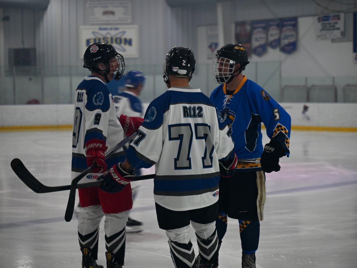 RCSD's tweet photo. Our own Richland Blueliners hit the ice honoring the memory of our fallen deputy Jake Salrin. They played a special game and Salrin's family accepted an honorary jersey! Even part of our OPL crew came out! It was a powerful tribute to their colleague's legacy. #TeamRCSD https://t.co/bc582l6Bbx