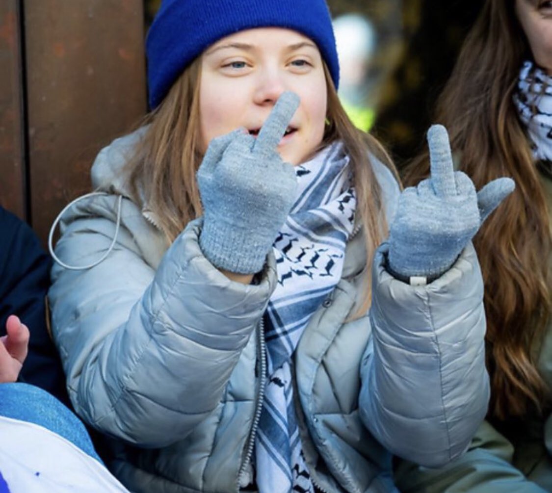 BREAKING: Greta Thunberg and another 50 of her climate and anti-Israel protesters have been detained by the Swedish police after they blocked the entrances to the Swedish parliament. Greta seems to have been in a particularly bad mood today as the picture below shows.