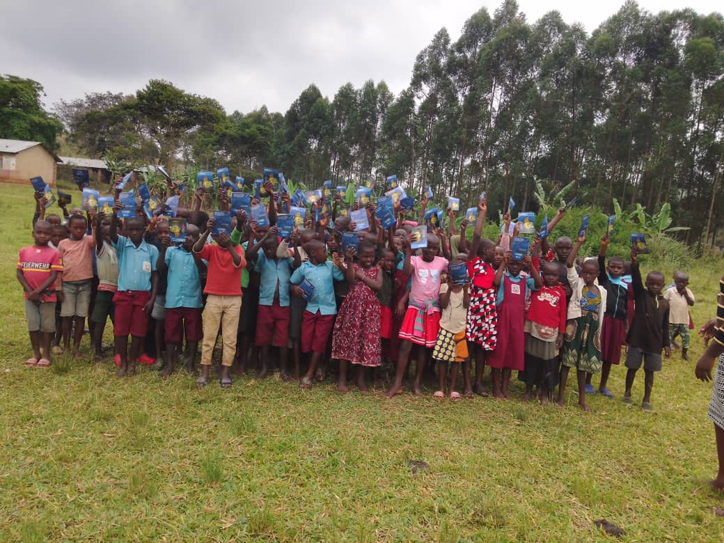 OnehopeUganda's tweet photo. "It's always incredible to witness the joy and excitement on the faces of children and youth as they receive God's word. Their enthusiasm is contagious and reminds us of the power of hope and faith. #Storiesofhope" https://t.co/HogktYWbId