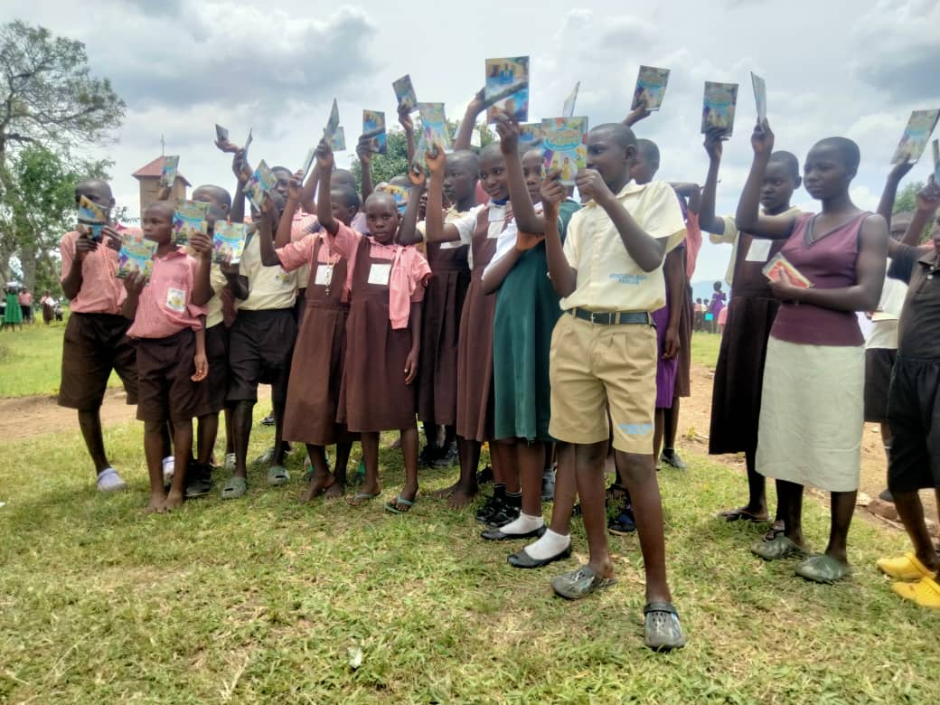 OnehopeUganda's tweet photo. "It's always incredible to witness the joy and excitement on the faces of children and youth as they receive God's word. Their enthusiasm is contagious and reminds us of the power of hope and faith. #Storiesofhope" https://t.co/HogktYWbId