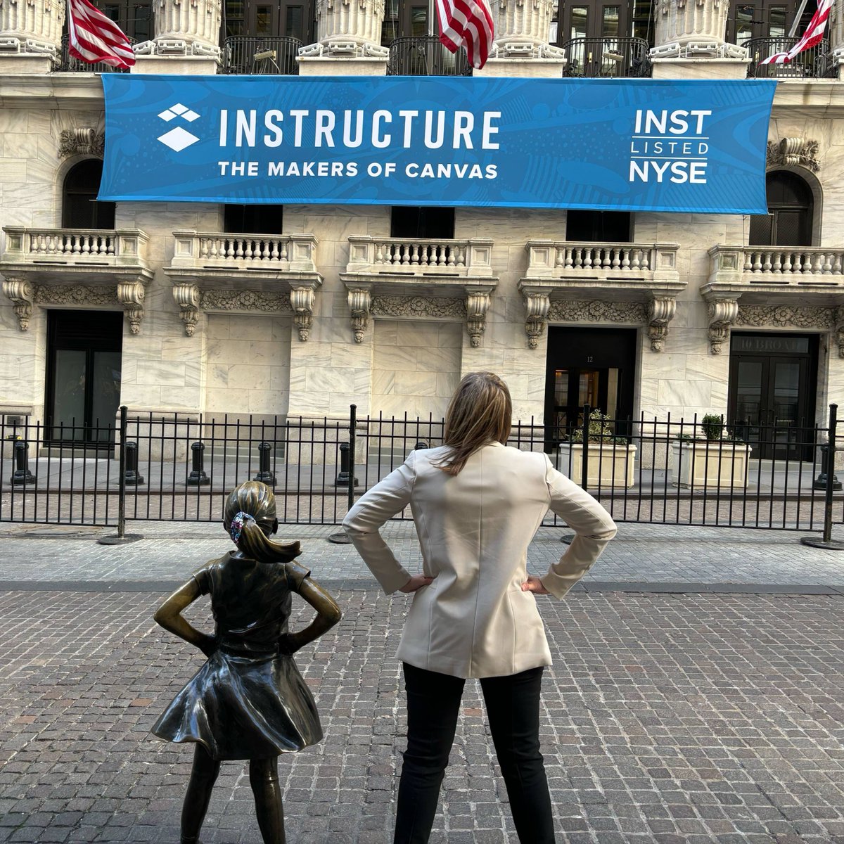 Instructure's tweet photo. Yesterday was such a great day ringing the closing bell at the #NYSE! It was such an honor being able to do this during #WomensHistoryMonth and we loved seeing Kim Davis, Sr Director of Revenue Enablement, standing outside the #NewYork Stock Exchange Building! #WHM https://t.co/9OWLaOtLif