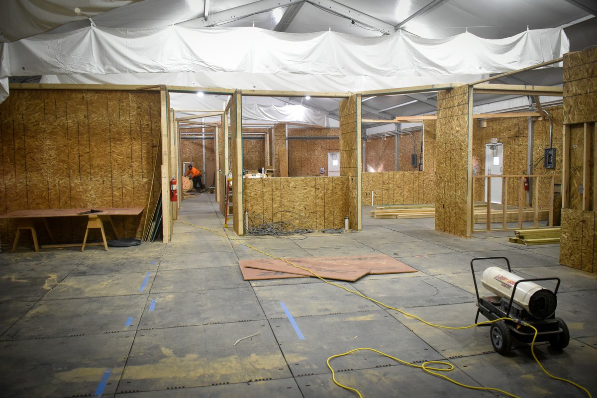 Busy morning inside @BroadStMarket. @EASCarpenters are finishing up installing drywall and insulation. Framing and plywood is up in the main part of the tent. Electric is wrapping up soon!