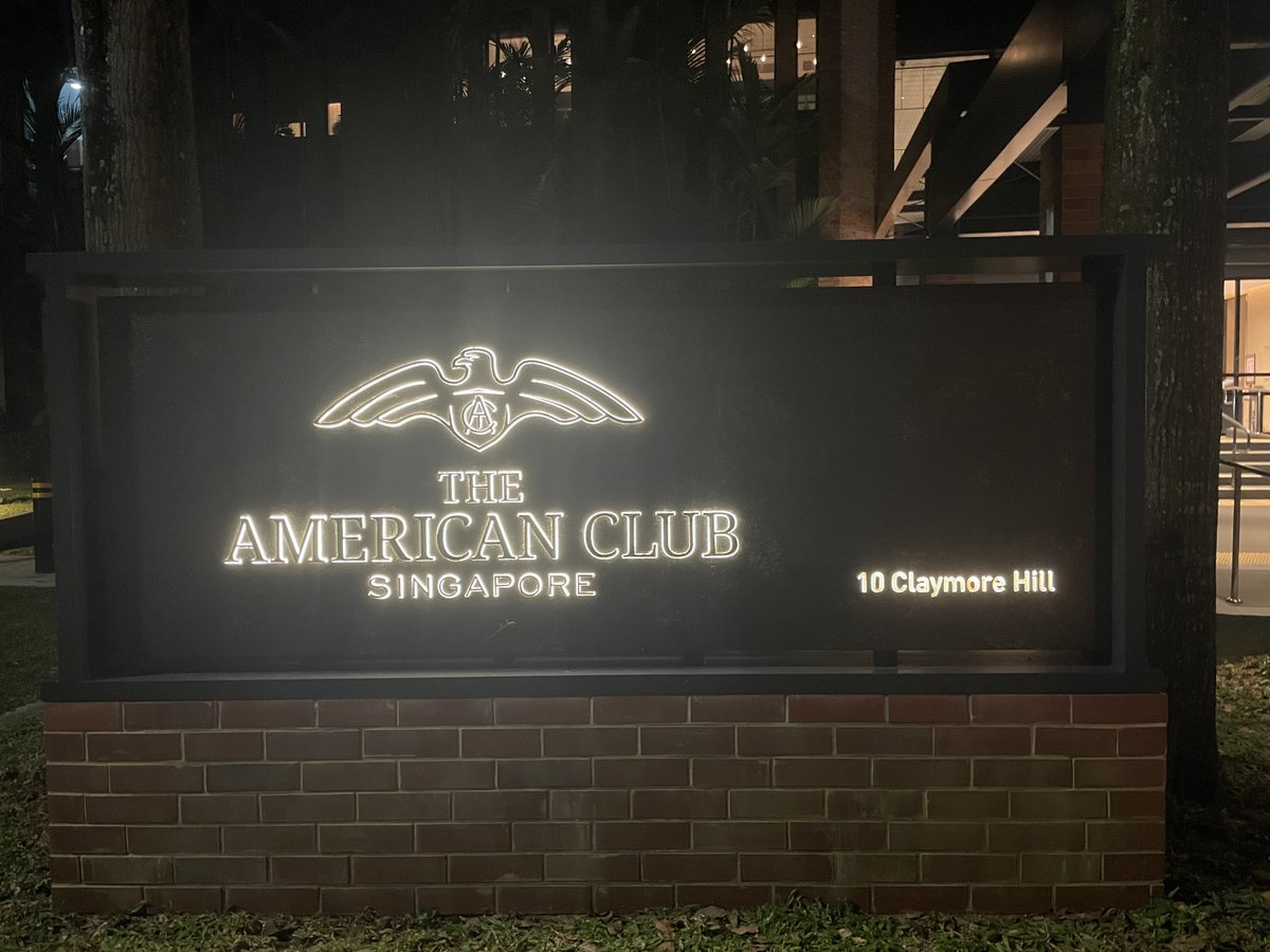 The UT Austin @TexasFootball flag in the American Club in Singapore.