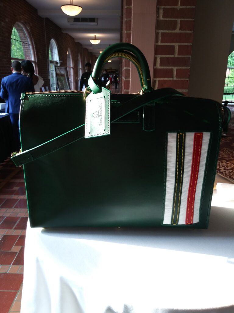 Product Reveal: Italian Racing Inspired Duffle Bag. bit.ly/46hSuXs #BespokeTravelBag #BespokeDuffleBag #CustomSportsBag #ItalianRacingInspired #LuxuryTravelBag #ClassicCarRacing