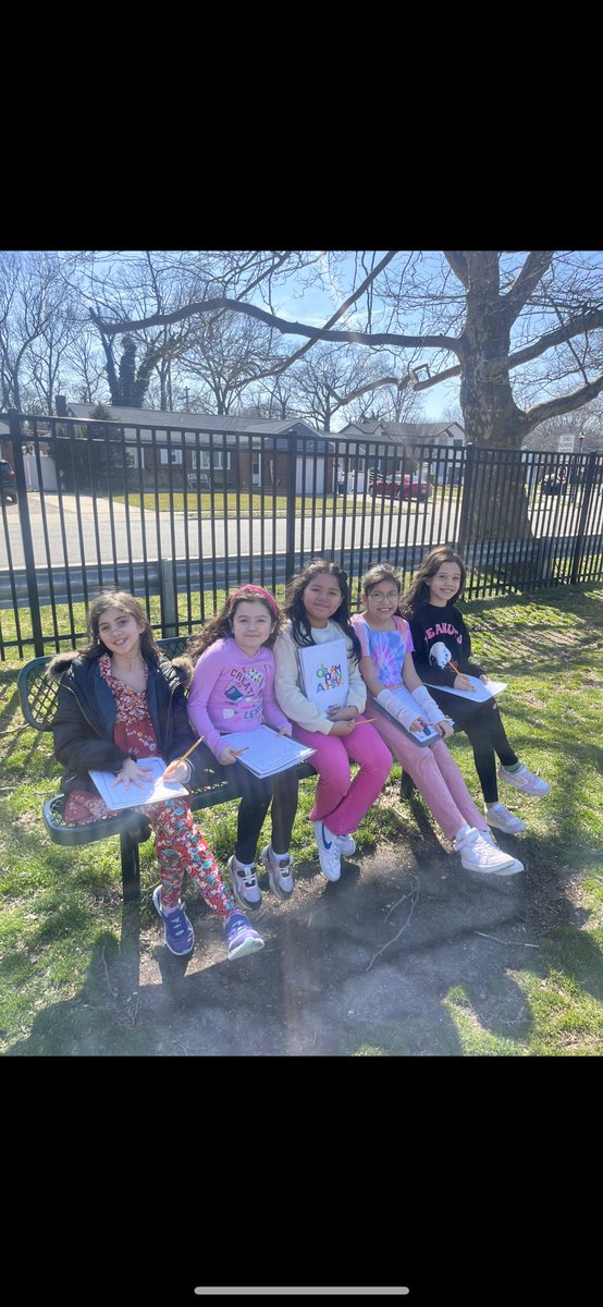 Enjoying “Little Author’s Club” outside in the beautiful weather today!