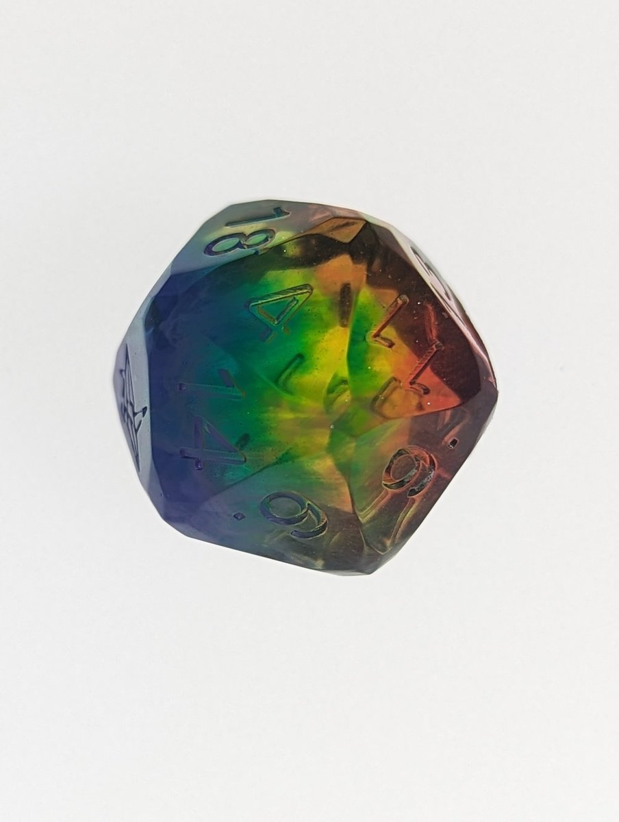 Rainbows are so satisfying.

Raw dice, straight from mold.

#D20 #HandmadeDice #ResinDice
