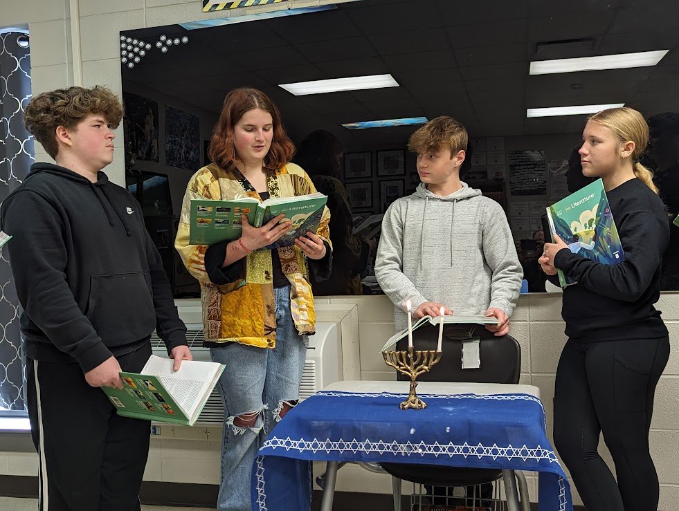 8th_gr_GRC's tweet photo. My #algifted students celebrated #Hanukkah as they read and "acted out" The Diary of Anne Frank. It's always good to get their eyes opened to a new experience. #AnneFrank @alabamagifted @Alabasterk12 @jillianjthomas https://t.co/zAkCu9XyU1