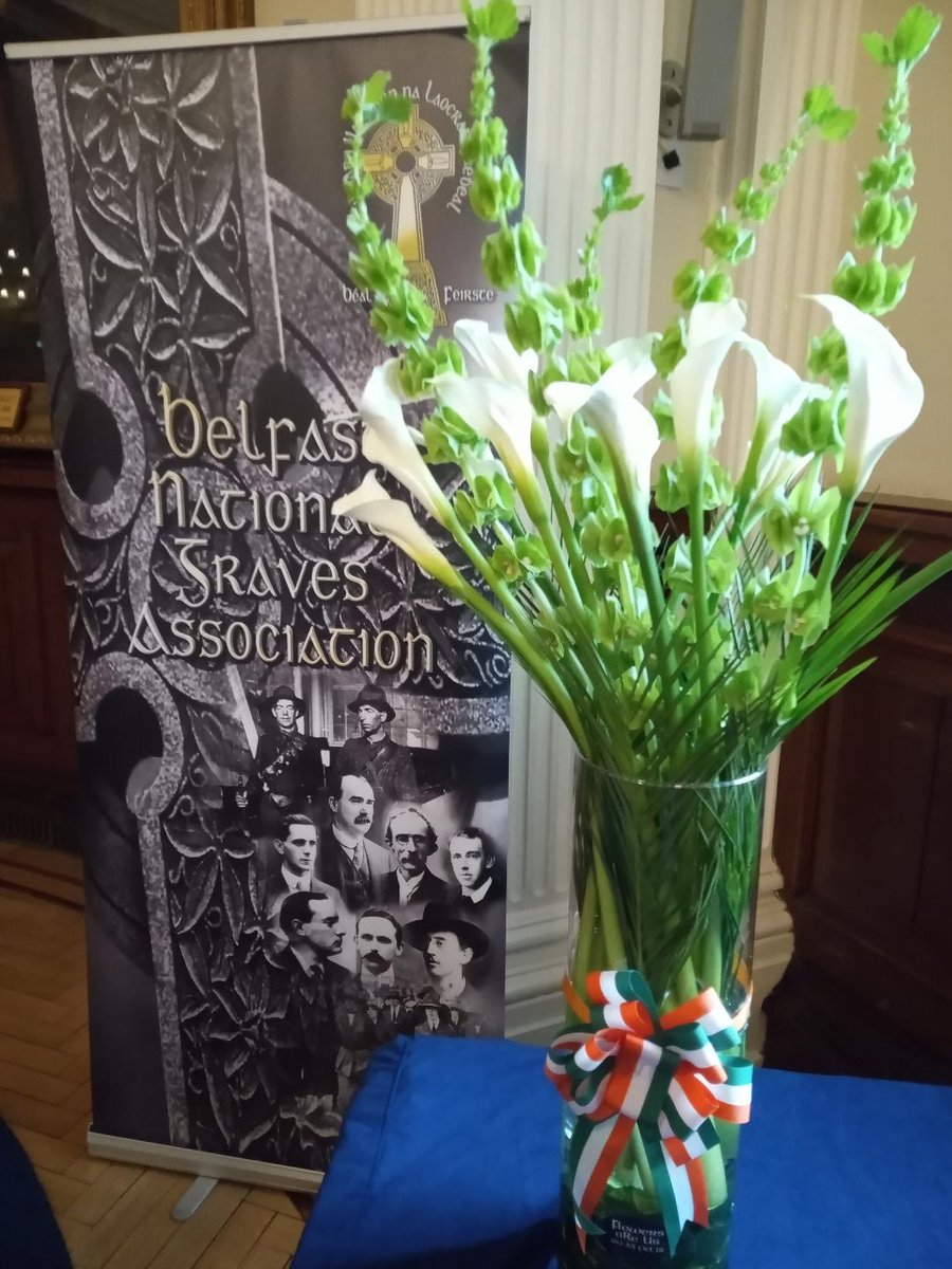 NGABelfast's tweet photo. Joe Austin, chair of the National Graves Association Béal Feirste, addressed the 2024 Easter Lily launch in Belfast City Hall today. Wear your Easter lily with pride. Fuair siad bás ar son saoirse na hÉireann. https://t.co/689bb9feI3