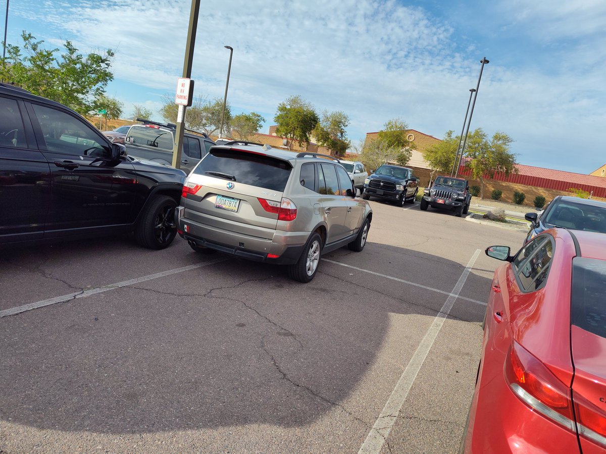 thecoachwang's tweet photo. @junior_miller for your might be an a$&amp; if segment. BMW parked in 3, but really 4 spots, at AZ Spring Training 24. https://t.co/MbAzyNX9RL