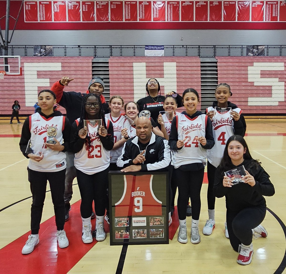 The Fairfield Warriors youth program had their awards night tonight and part of the celebration was to recognize Coach @KenBooker8 on his final season, an undefeated 28-0, with the program! They retired his number (number of seasons with the program). Thank you, Ken!!!