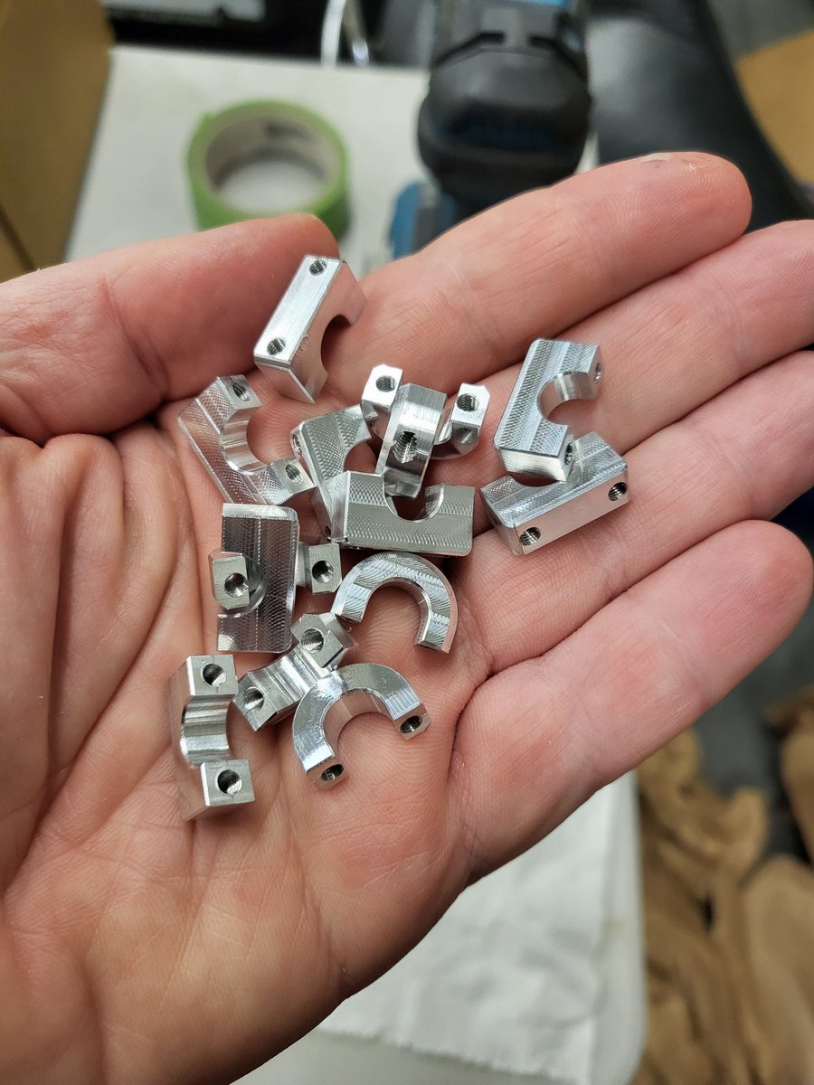 dexhandv2's tweet photo. I don't normally machine a lot of parts at this scale, but it was kind of a fun challenge to build these motor transmission brackets for our upcoming robot arm. #cnc #robot #humanoid https://t.co/CKEpQwLtGV
