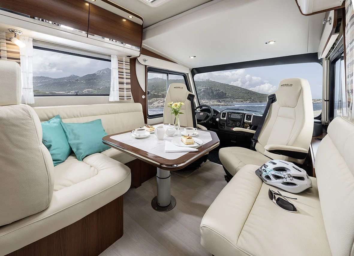 Sy45rp's tweet photo. The #Morelo HOME #motorhome is a spacious haven. With a scooter garage, off-grid capabilities, and four layouts for up to four people. Enjoy LED ambience, and a well-equipped kitchen with a Nespresso machine. Experience #luxury on the road. https://t.co/3PINHcu4Tn