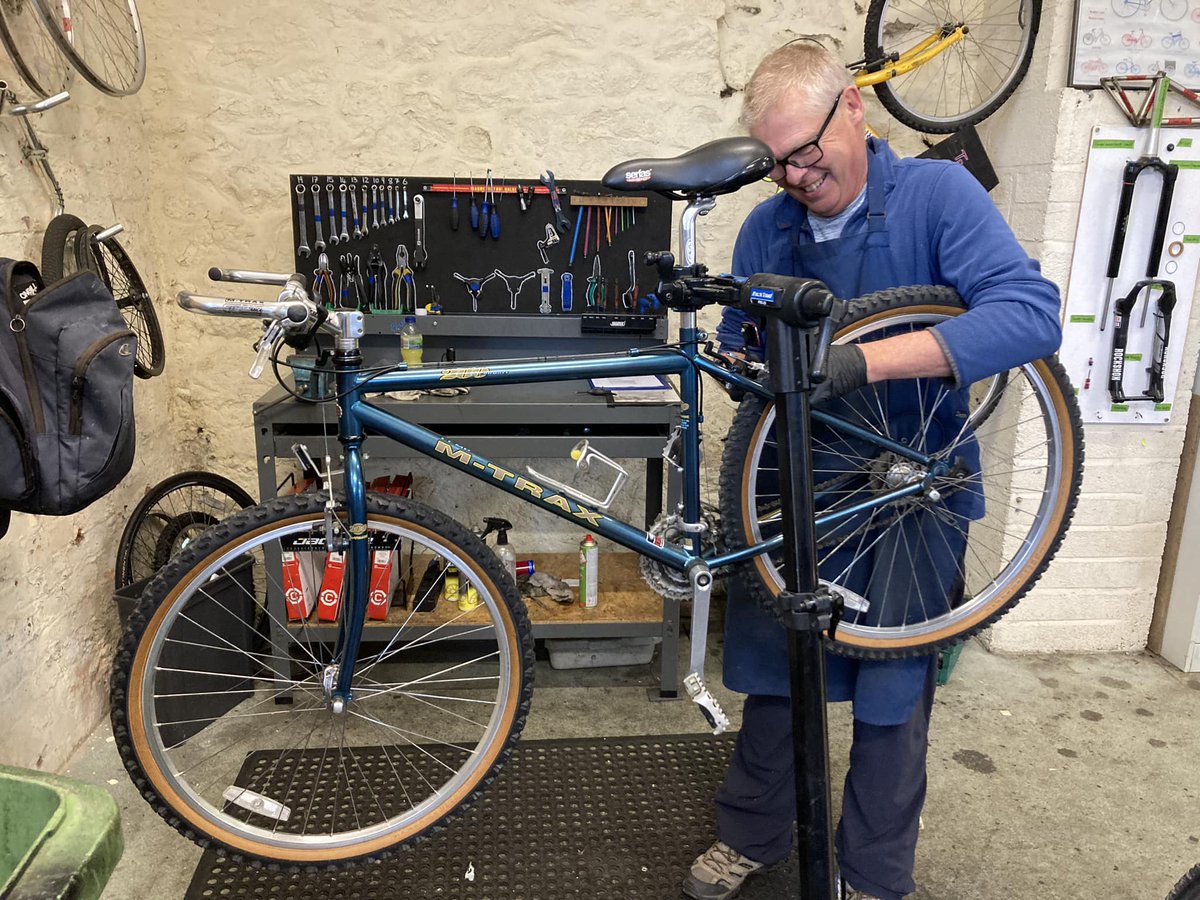 One of our volunteers, Paul, getting started on this beautiful Raleigh M-Trax, one of a pair that were generously donated in excellent condition.