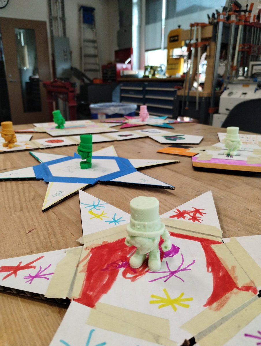 MakerZigler's tweet photo. Kindergarten leprechaun traps are set and ready to load. Today they worked with geometry students to assemble and decorate their nets from laser cut parts. Tomorrow they punch holes and run string so they can snap shut. 3D model purchased from MadeToLifeStudios on Cults3D. https://t.co/9pexhvjYkT