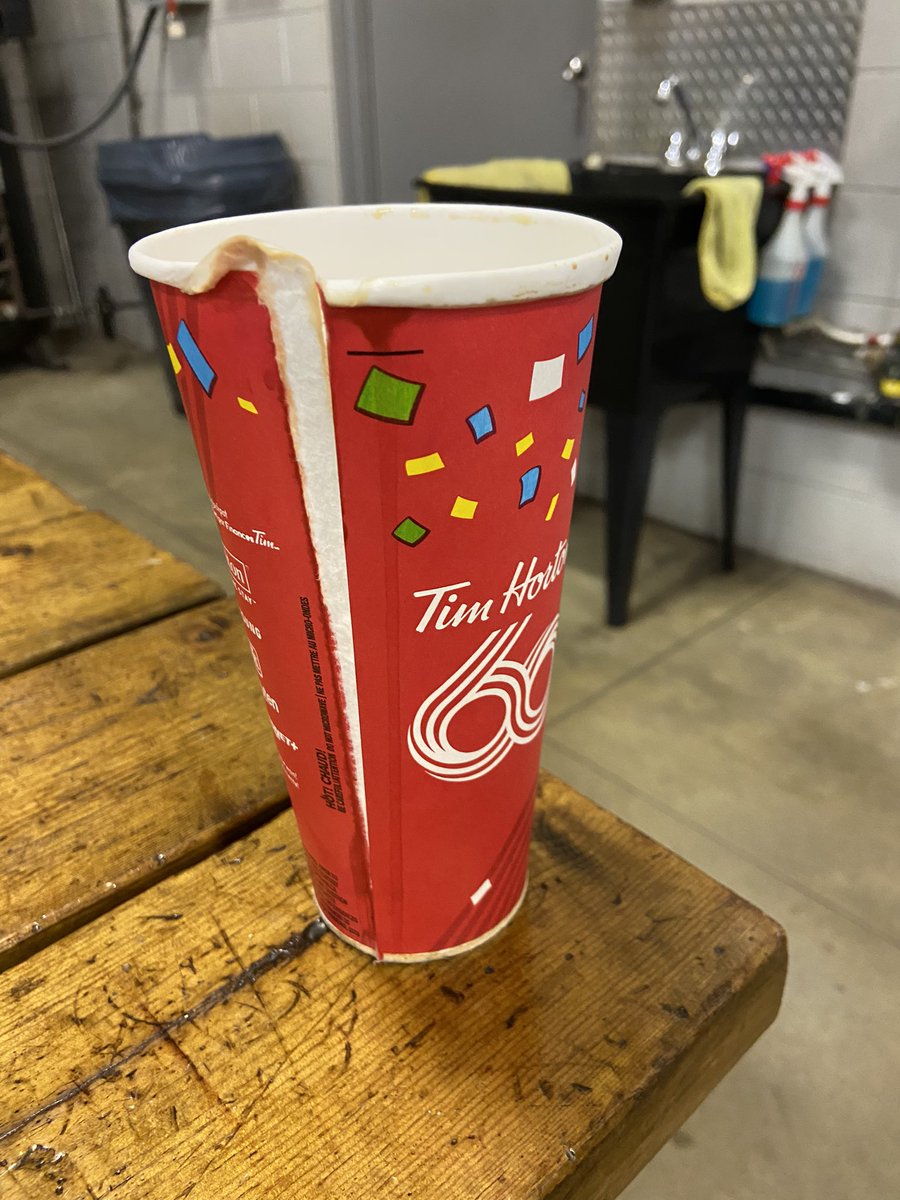 MonnieWhite's tweet photo. @TimHortons I’m so happy my coffee spilt all over the place, honestly it’s my favourite thing to happen: please keep making your cups like this so I can spill more hot coffee on my lap. 

PSA https://t.co/E8ooKFTOdE