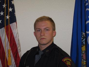 fdlpolice's tweet photo. 3/24/15 we tragically lost a hero on our City streets. We always remember Trevor &amp; how he lived as only a hero could &amp; he gave his life protecting us all as only a warrior would. Our heartfelt thoughts go out to Trevor's family, WI State Patrol, and to all those impacted by 3/24. https://t.co/ojVKhKLfkM