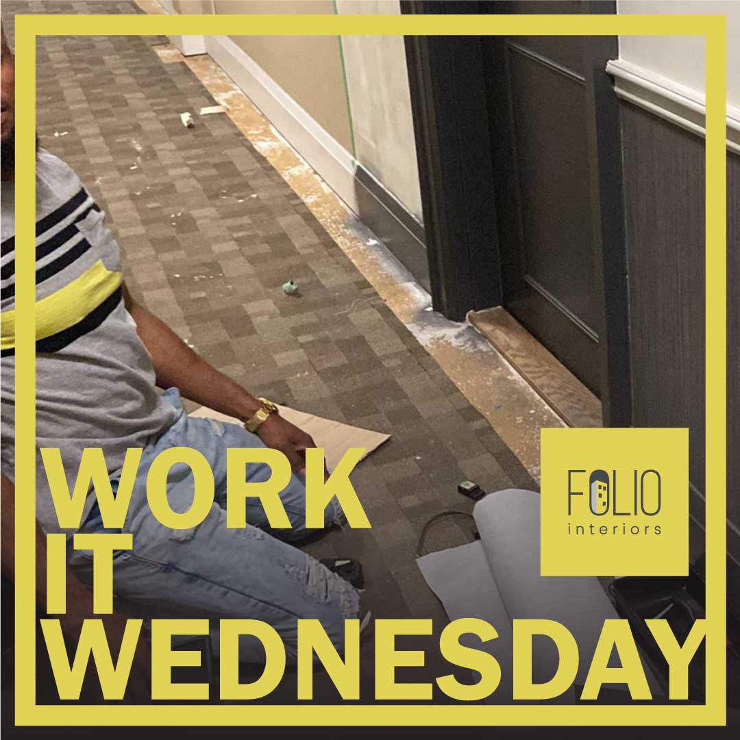 foliointeriors's tweet photo. A tradesperson kneeling by the door in the condo corridor, cleaning the substrate in preparation for installing the new threshold. #FolioInteriors #WorkIt #Wednesday https://t.co/zRLOQ0iyNa