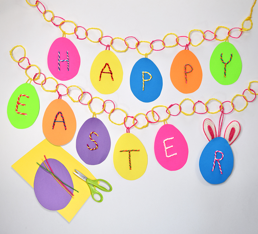 Make a Happy Easter Banner using construction paper and Wikki Stix! See more Easter crafts on our website! 🐇 🐰 #wikkistix #Eastercrafts #craftsforkids #wikkistix