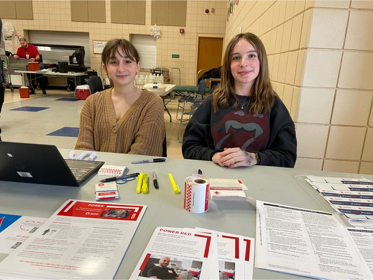 HMS 7th graders are eager to help those arriving to donate blood during the Red Cross Blood Drive.