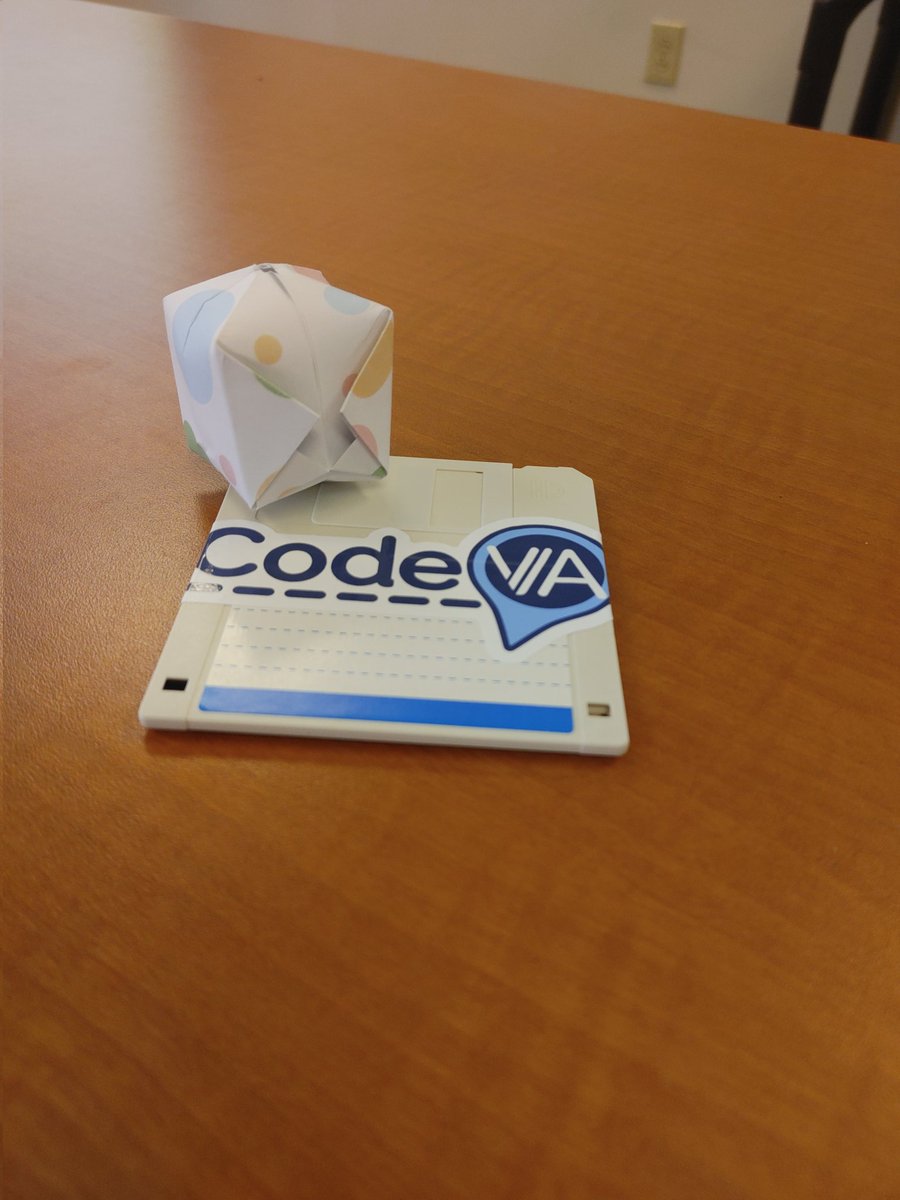 Making Oragami and leaning Computer Science concepts with @HottKristinhott from @codeVirginia! Check out my work and the custom make coaster from Kristin. #edtechrva2024