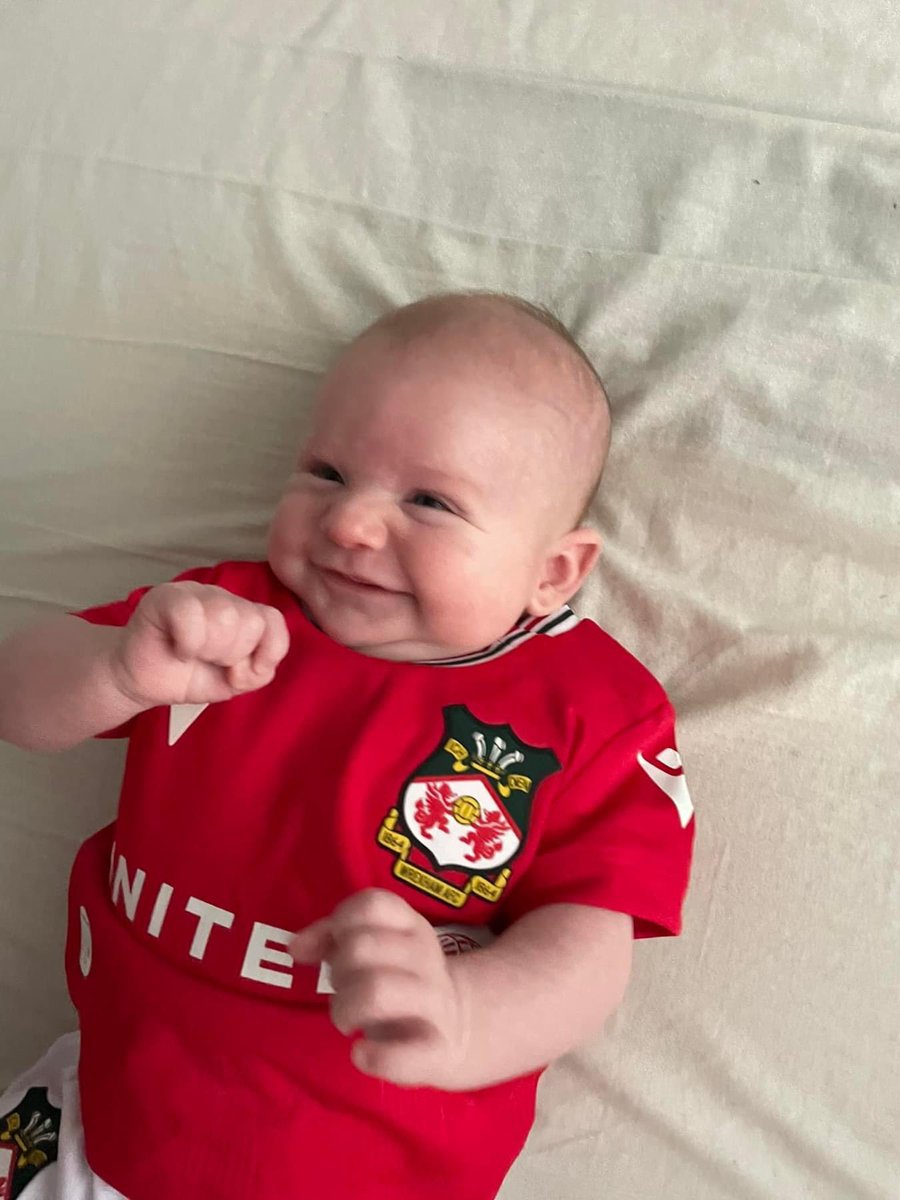 So Jake bought this kit at the club shop, even before he was born.   
Finally fits…. and the little fella looks made up.  
Ladies and Gents introducing <a href="/Wrexham_AFC/">Wrexham AFC</a> latest fan.   Can’t wait to see with us in the Tech End 🙌