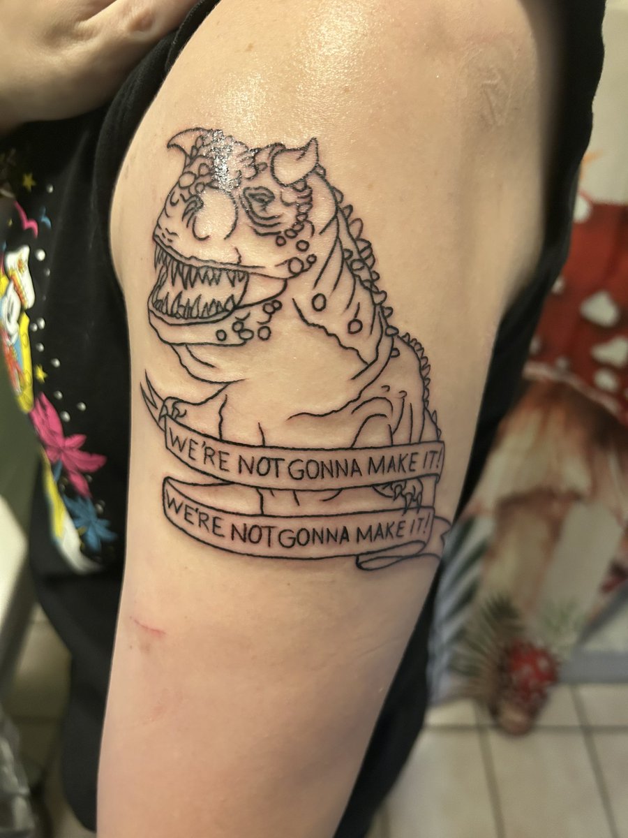 IceDragonBeth's tweet photo. I kinda fell out of using X, but for the sake of it. I got my first tattoo! A tribute to an amazing ride at #disney #dinosaur  #disneyworld #tattoo Dr. Seekers voice lives rent free in my head. https://t.co/IOFZBkjWcw