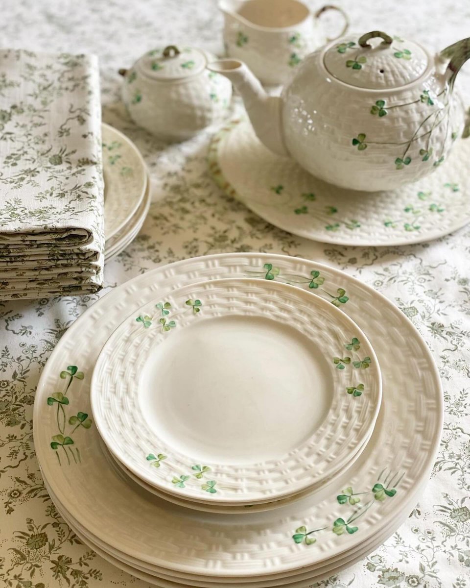 A table adorned in shades of green creates a jovial scene for St. Patrick's Day. Instagram user tallwoodcountryhouse's Belleek 'Classic Shamrock' wares would look lovely on a festive table while celebrating an Irish brand that has been creating pottery for more than 160 years.