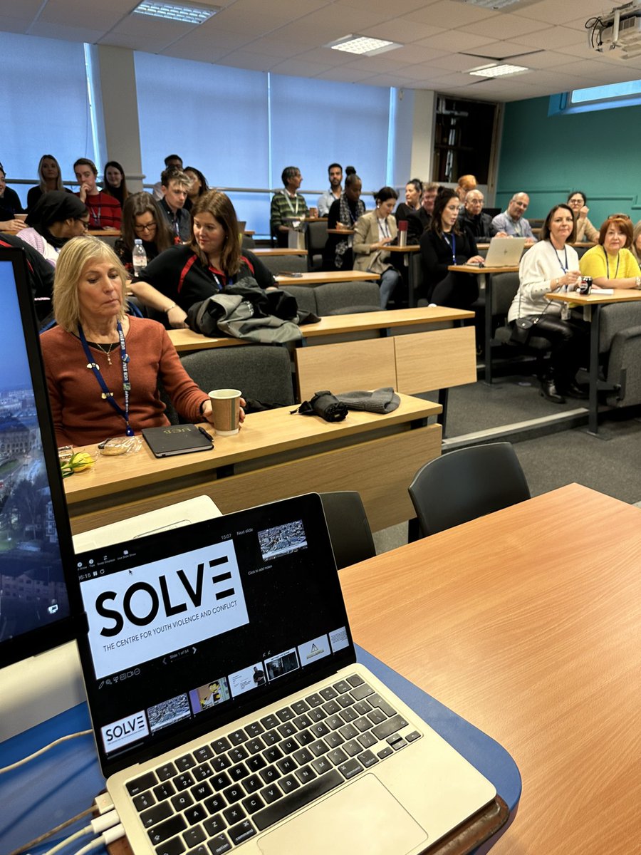 RealActionUK's tweet photo. Today, I revisited my old stomping ground at @UCBofficial, delivering a lecture on understanding gangs &amp; serious youth violence. It's been 4 years since I left my lecturer role to start SOLVE. 

Thanks to Natalie, Jacqueline, and the safeguarding team for the warm welcome! https://t.co/cI5gHhyOWp