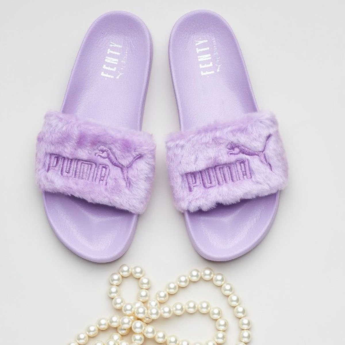 yall remember when these Fenty puma fur slides had the internet in a CHOKE HOLD???