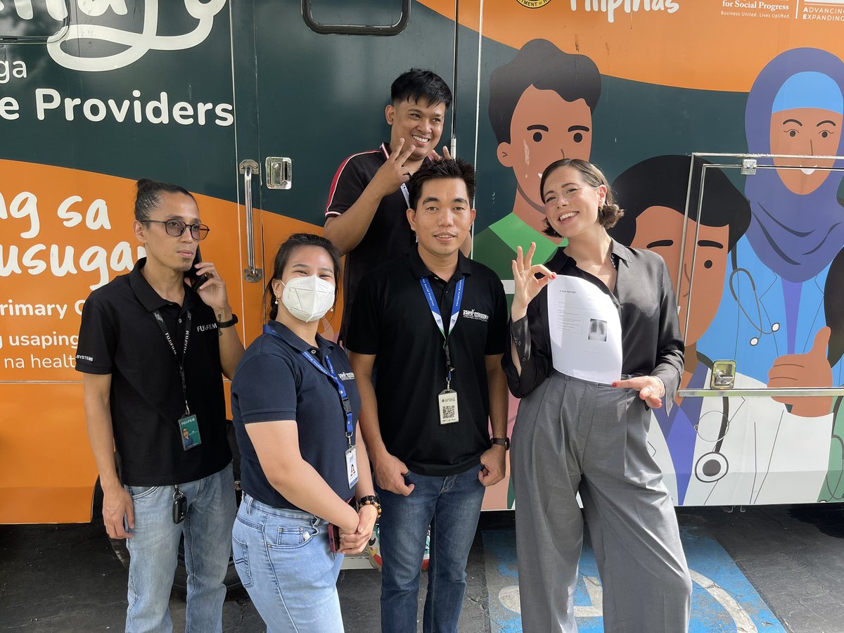 My colleague @EnlaFees just done her X-ray and made sure she has a clean lungs , she is flaunting the report ! @qure_ai made it so fast @PBSPorg packed it so well in a truck & @GlobalFund supported @DOHgovph endorsed it, @StopTB amplified #QureeringTBTogether #YesWeCanEndTB